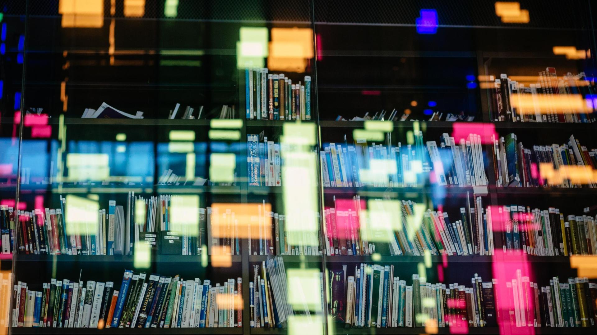 A snapshot of a library taken through a window.