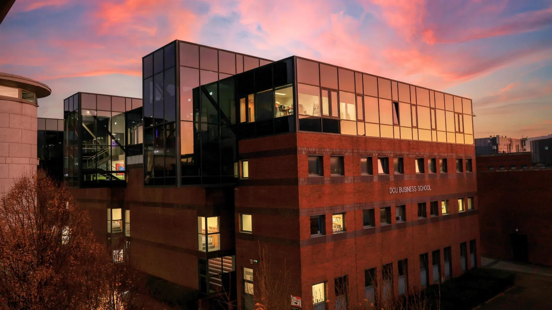 Shows DCU Business School at night