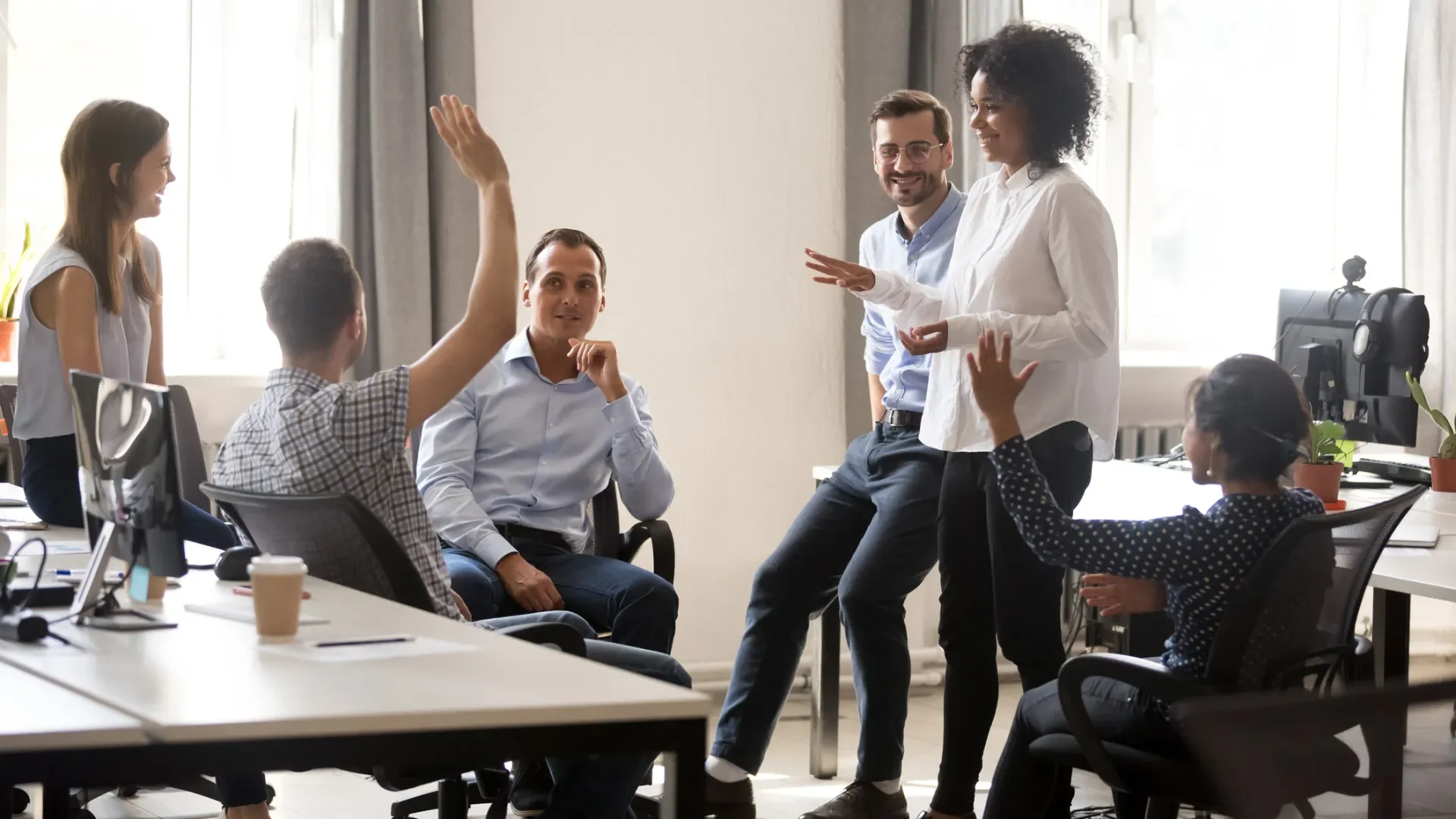 A group of people in a meeting