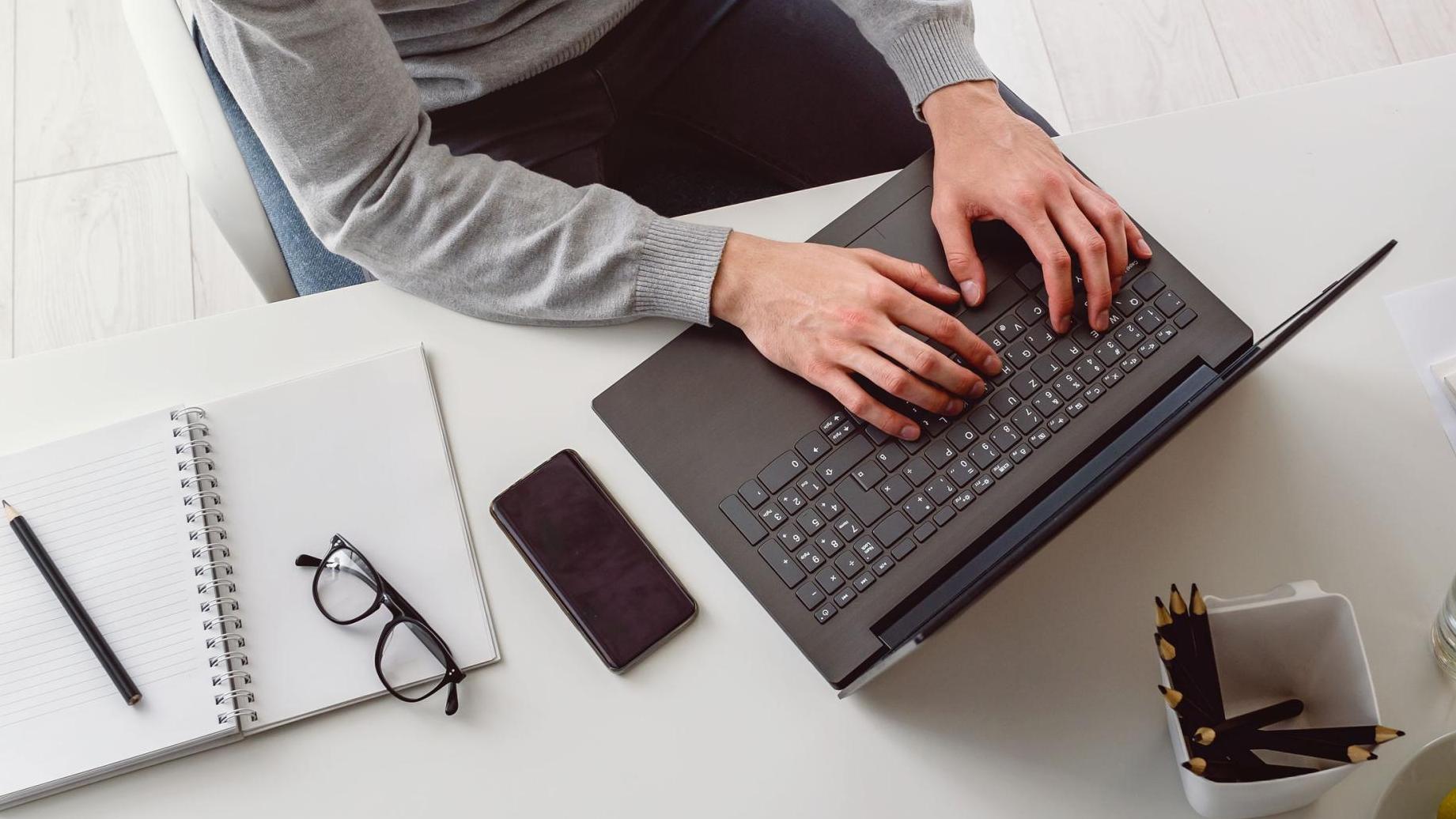 Writing on a laptop