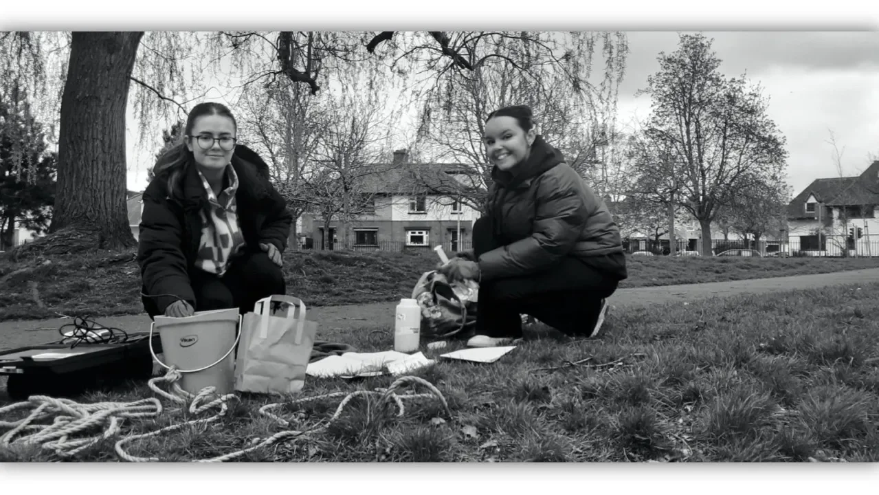Two students on a sampling trip to test monitoring tool