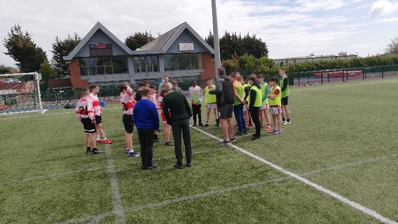 Secondary School at the Sports Day playing football