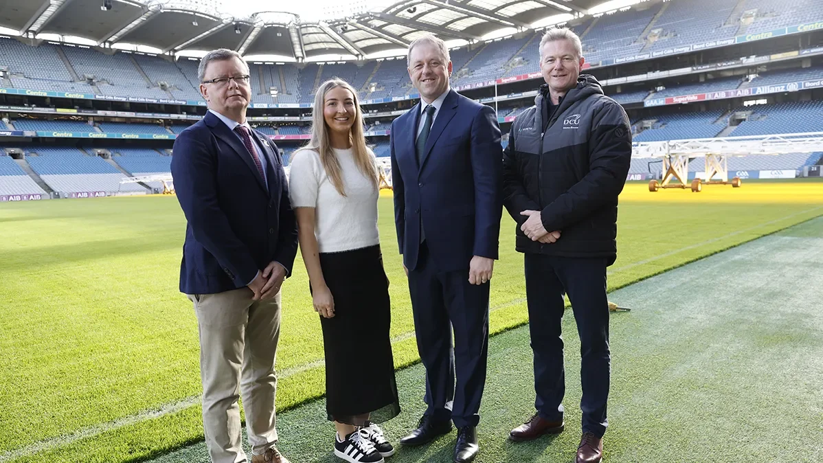Uachtarán an Cumann Camógaíochta Brian Molloy; Sophie Cotter, who plays for Naomh Mearnóg and studies at DCU; Thomas Byrne TD, Minister of State for Sport, Physical Education and the Gaeltacht; and DCU Director of Sport James Galvin. 