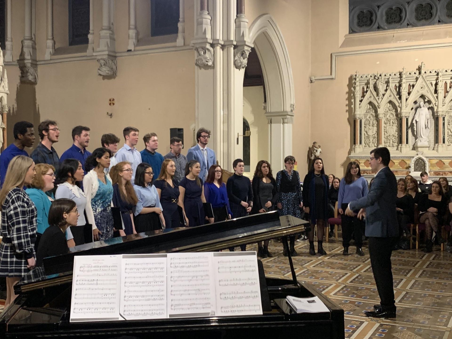 The DCU Chamber Choir performing in the All Hallows Chapel