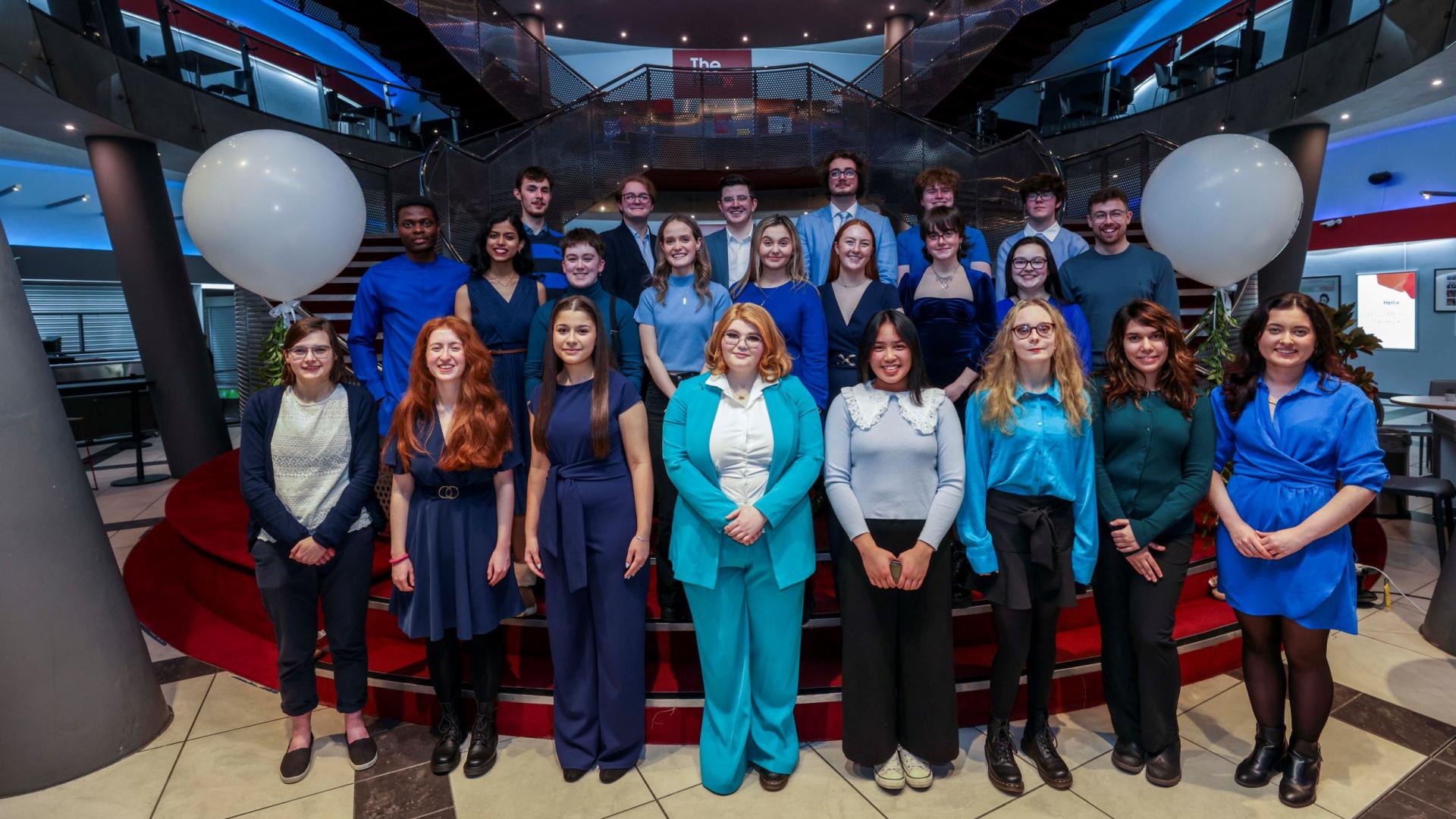 The DCU Chamber Choir in the foyer of the Helix