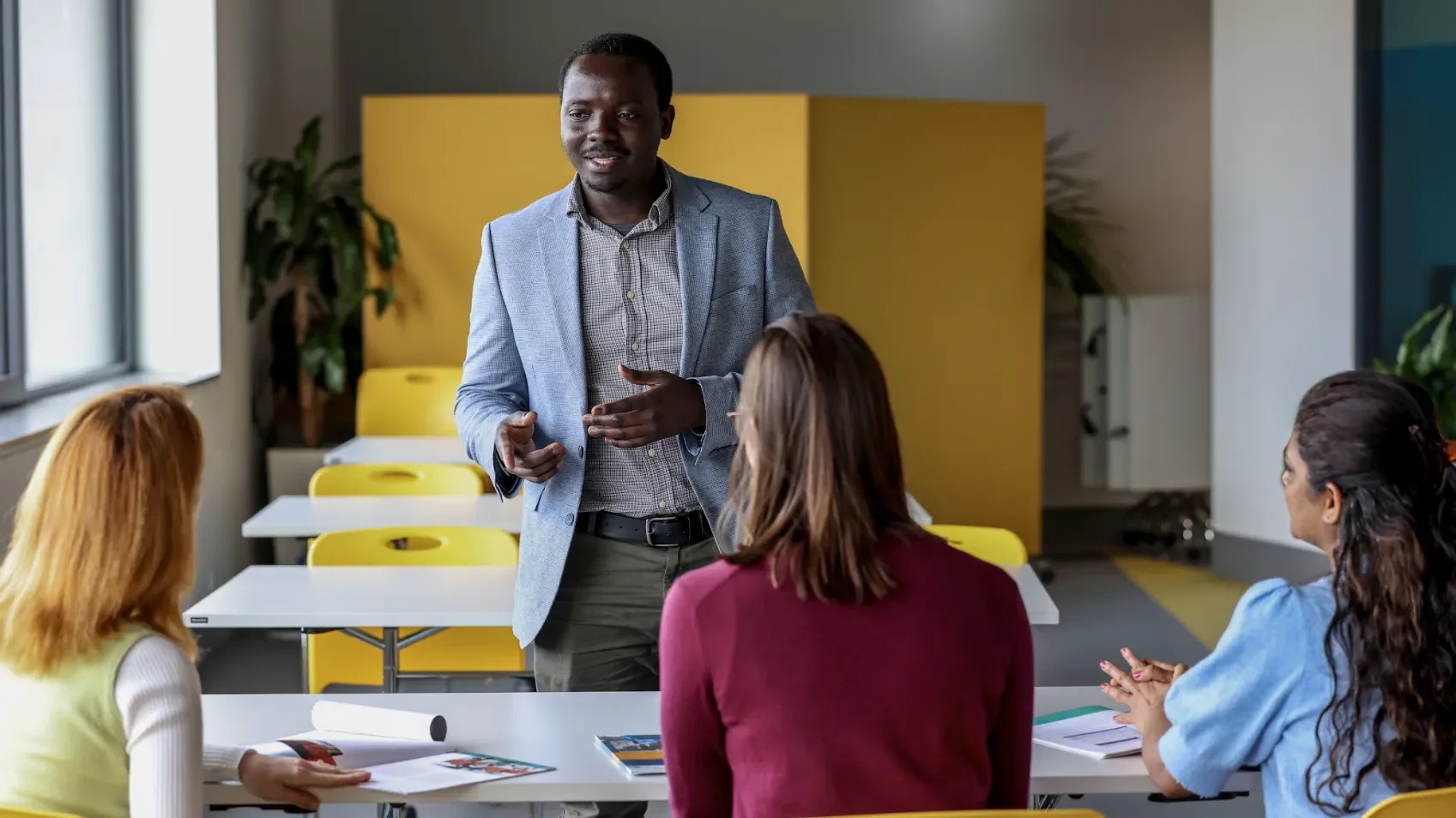 Image showing four people working together on a project