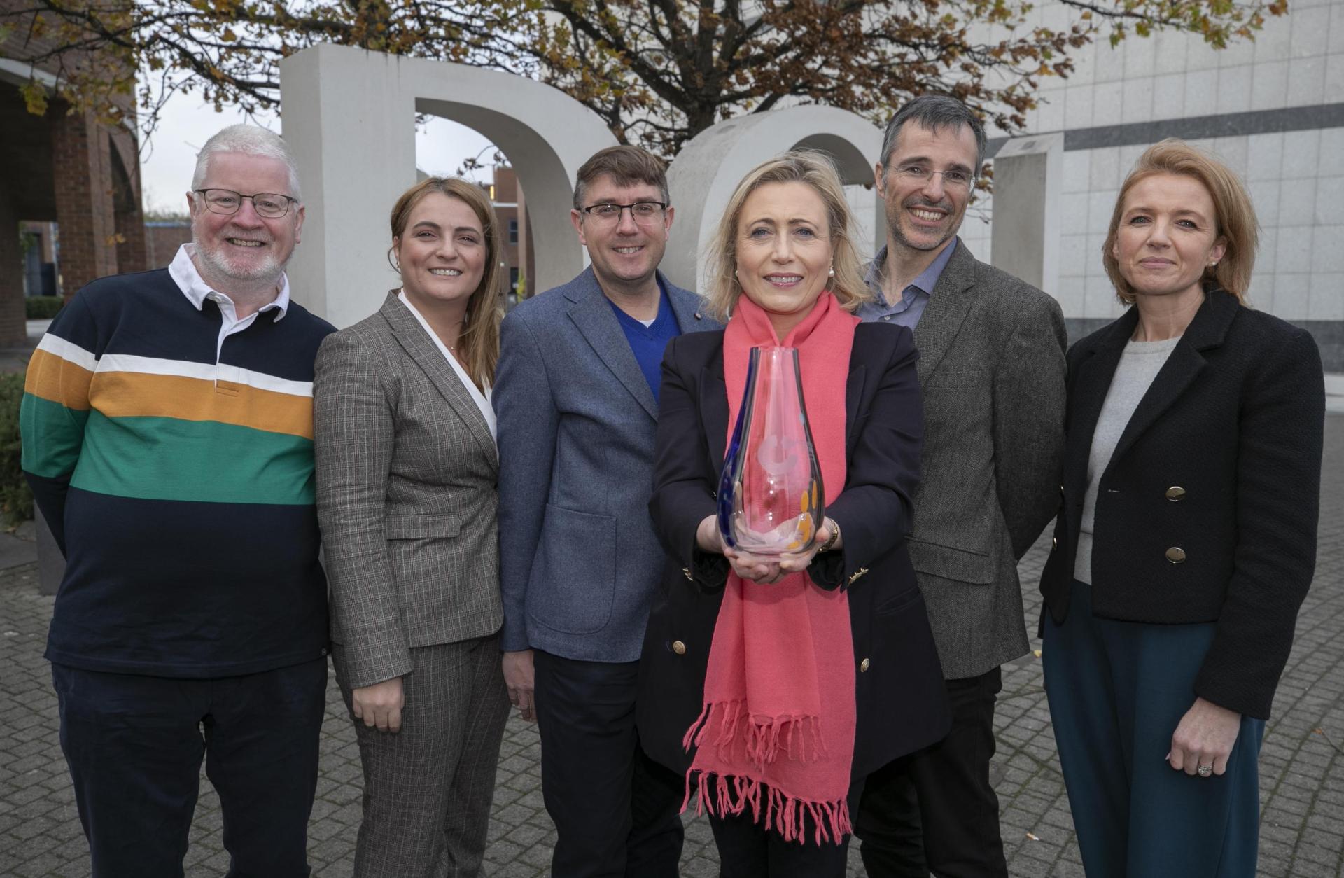 A group of six staff members from DCU Business School with their Athena Swan award