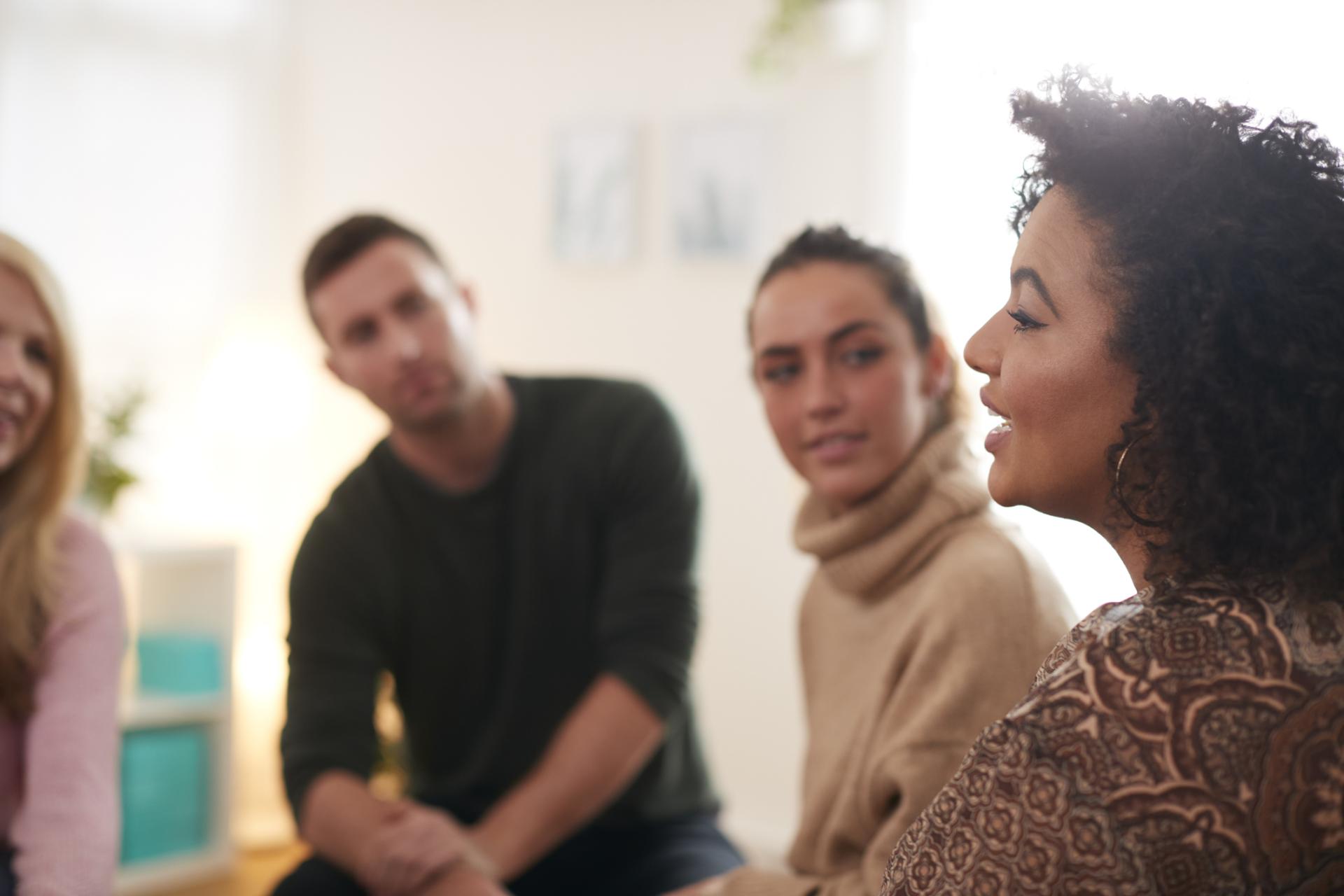 A diverse team of people having a discussion 