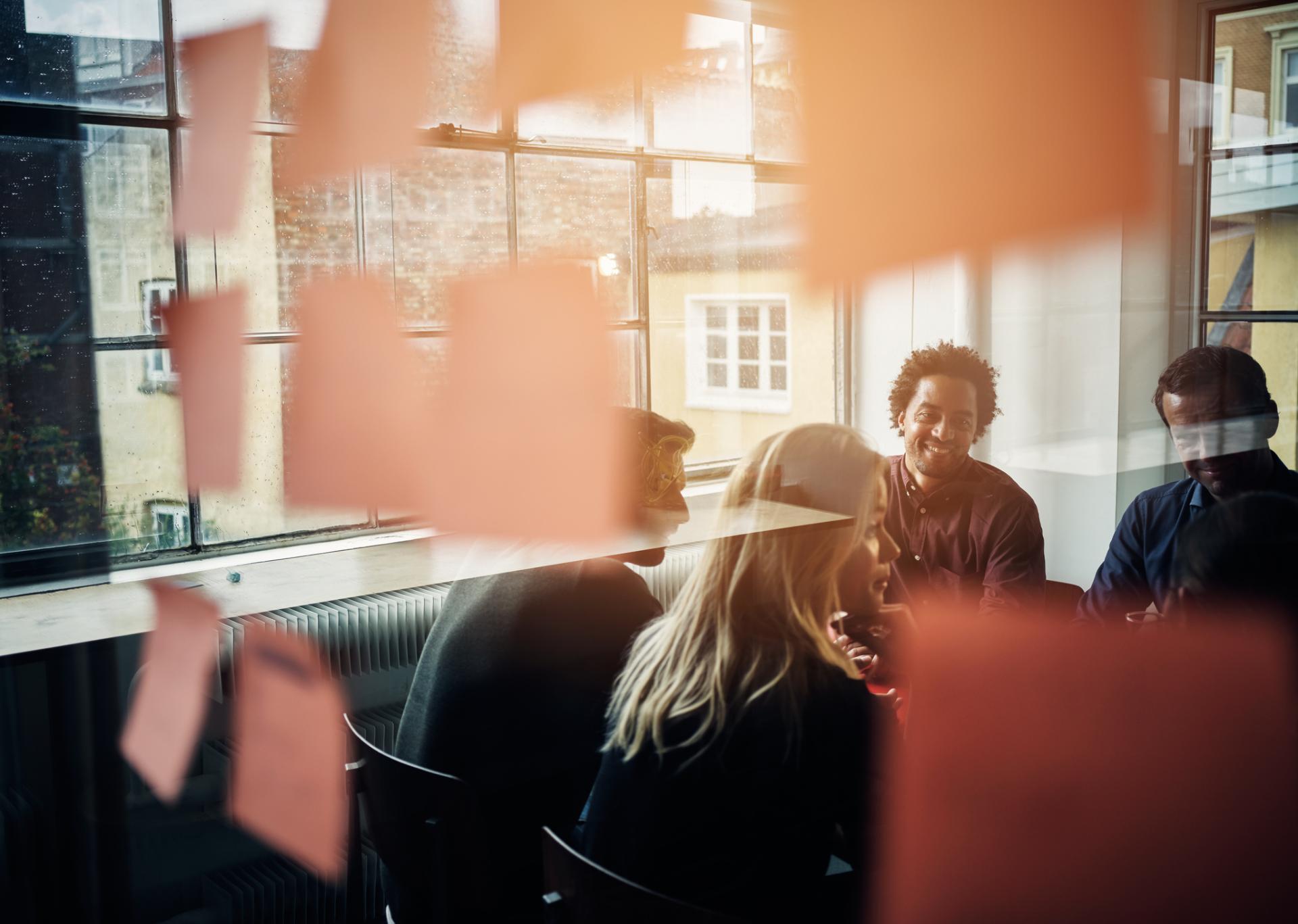 A diverse team of people having a discussion 