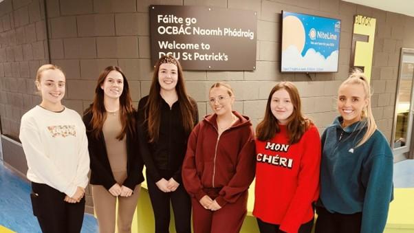 Students standing at the main reception in DCU St. Patrick's Campus