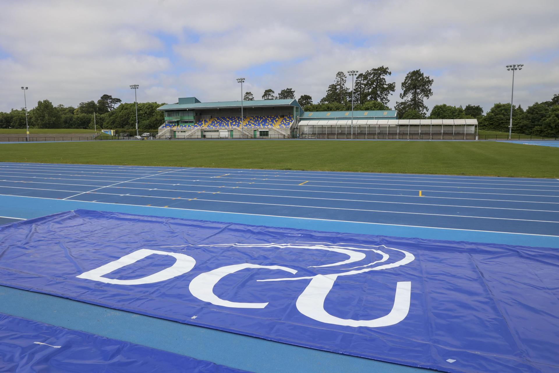 A wide shot of the newly upgraded track at Morton Stadium, with DCU logo.