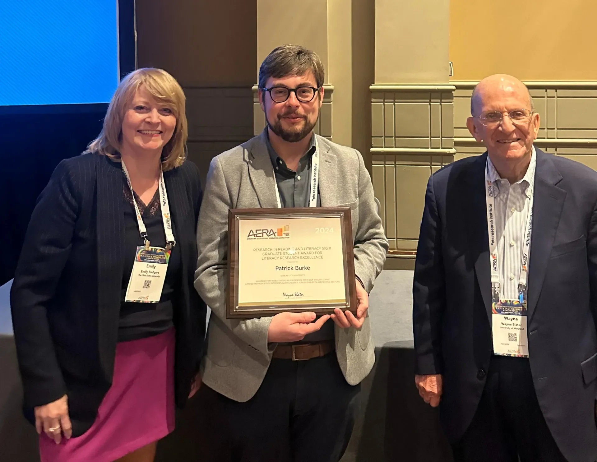 Dr Patrick Burke receiving his award.