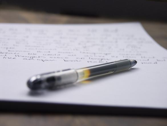 Image of a pen and paper.