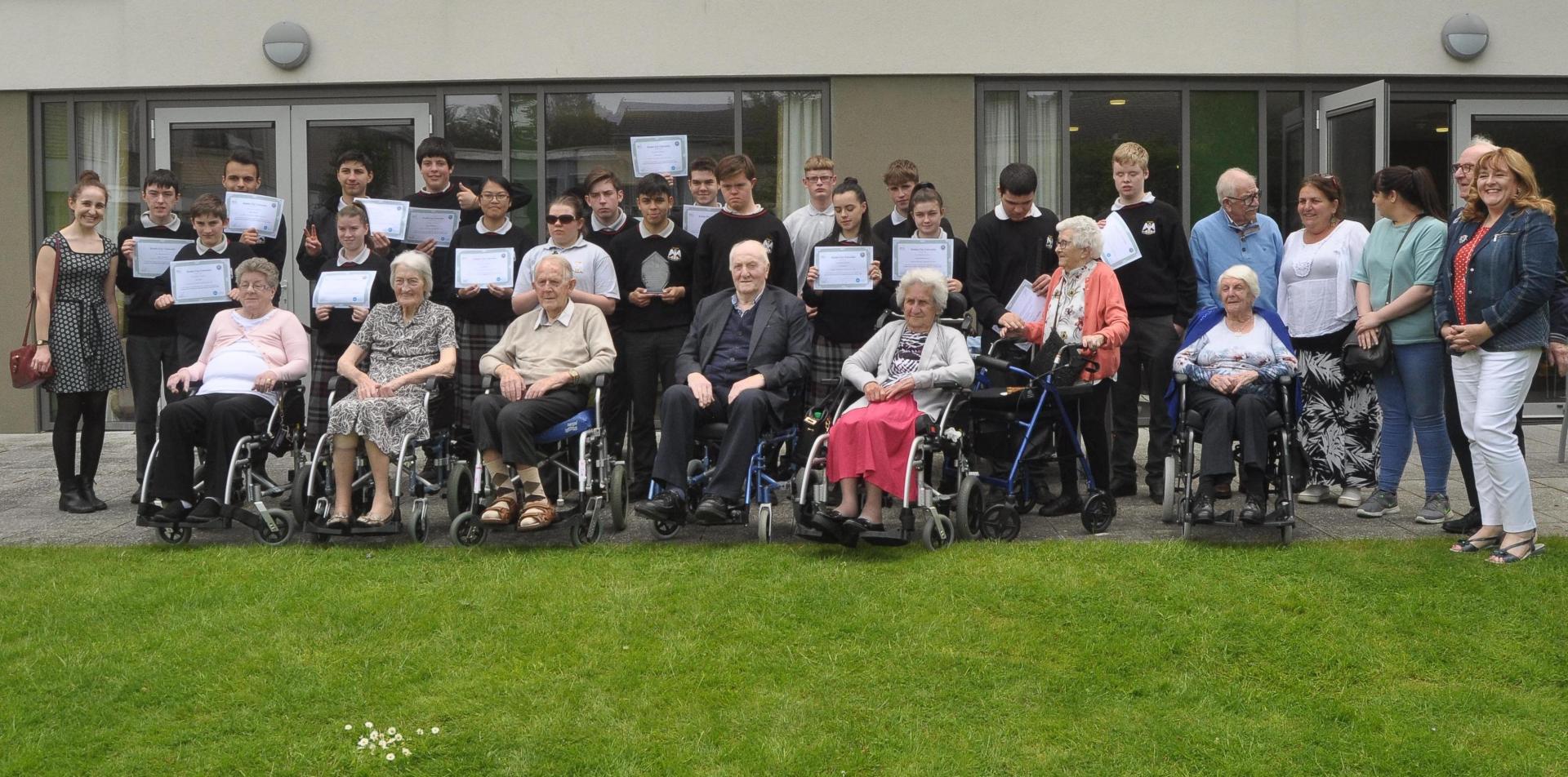 Rosmini secondary school students with residents of Nazareth care home