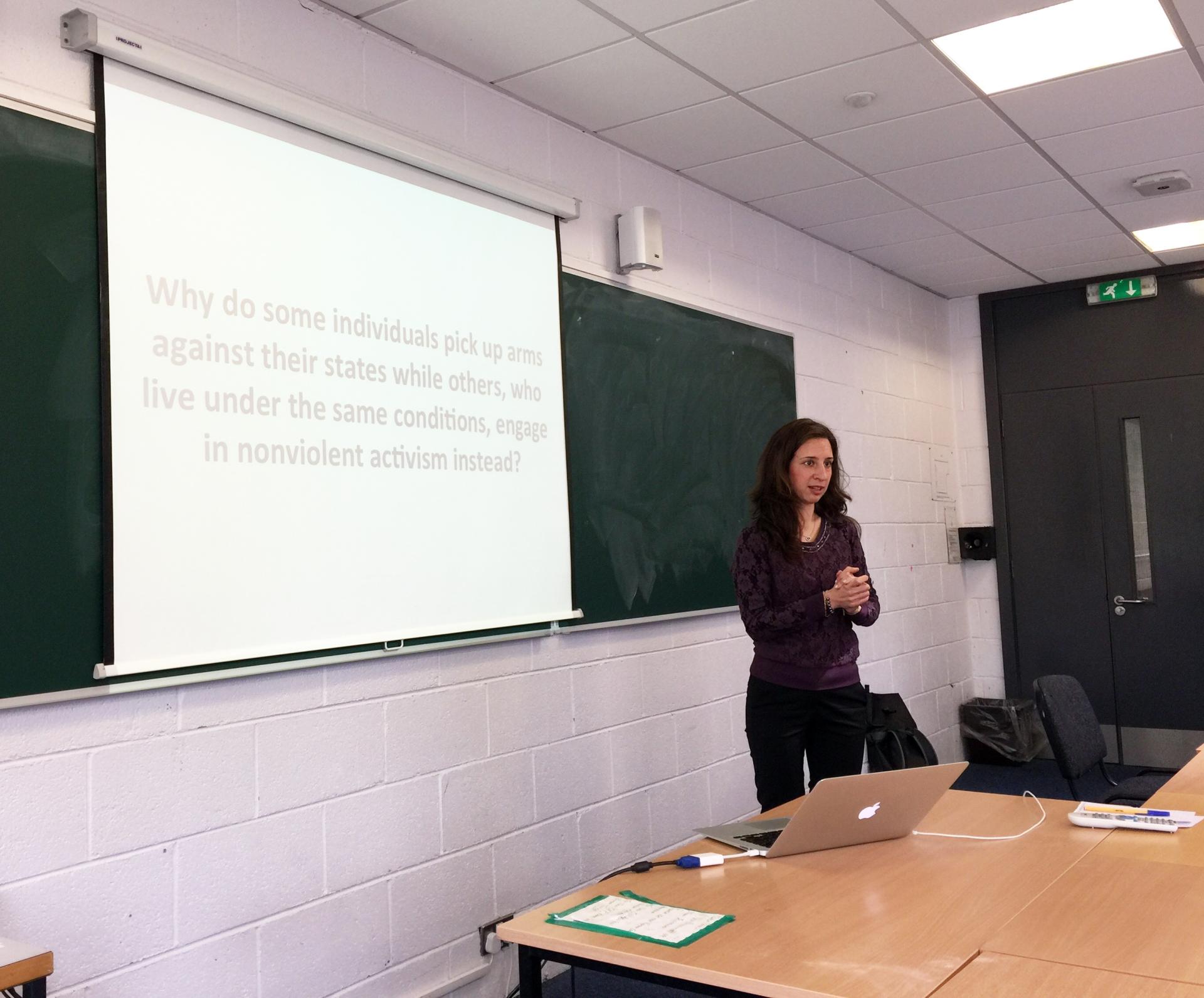 A researcher delivering a seminar at School of Law & Govt