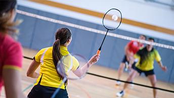 students playing badminton