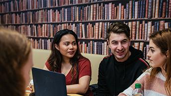 Students working together in library