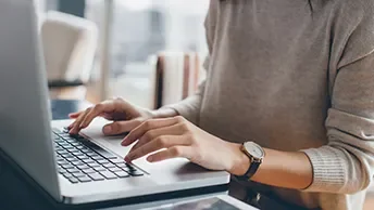 Stock image of person at computer