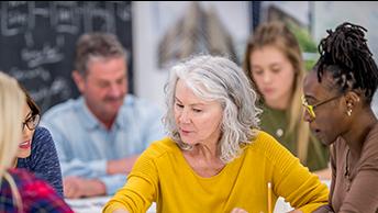 different age groups of people working together
