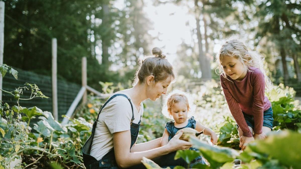 Mother and two children in nature