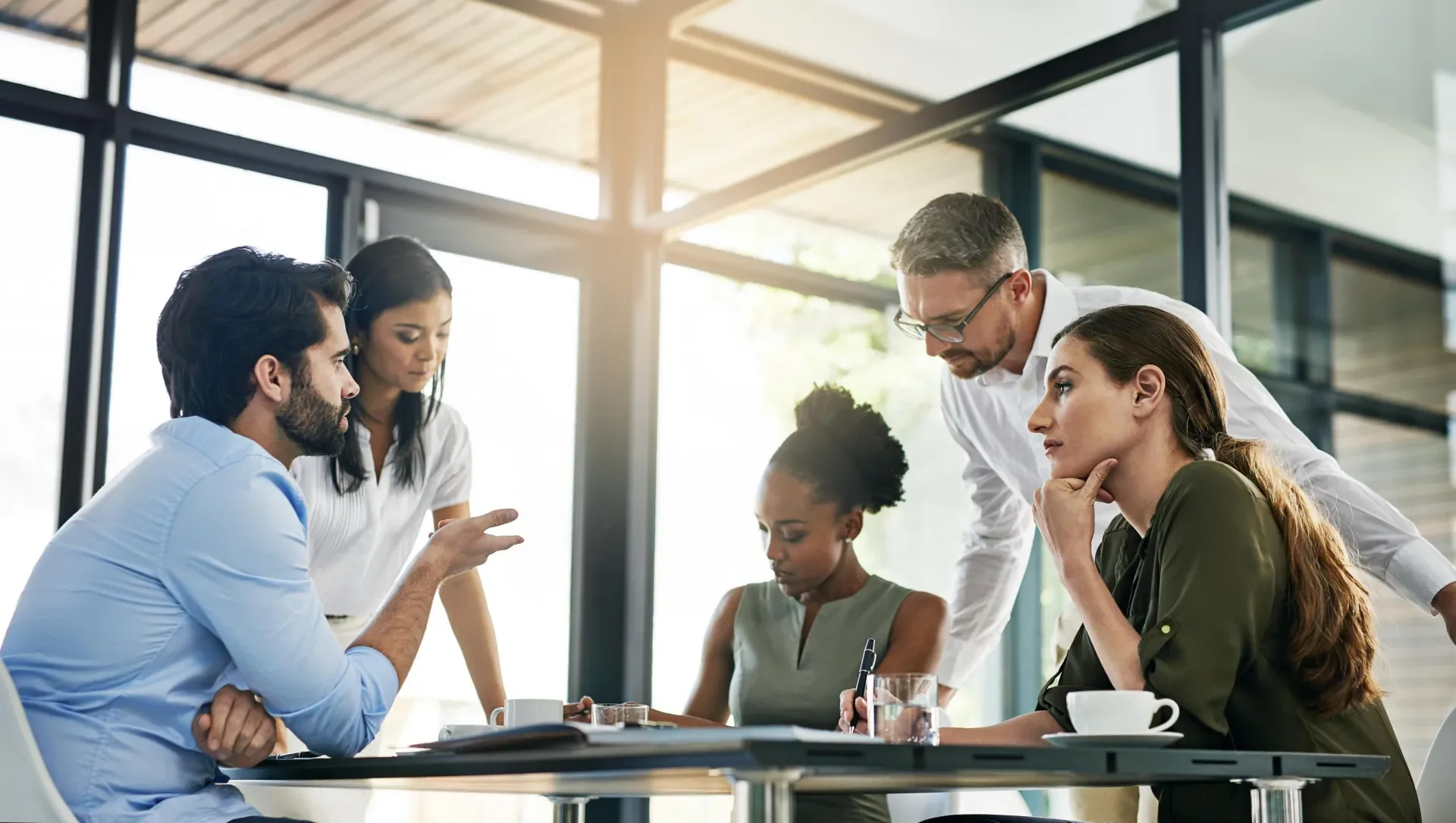 Group of diverse individuals having a meeting