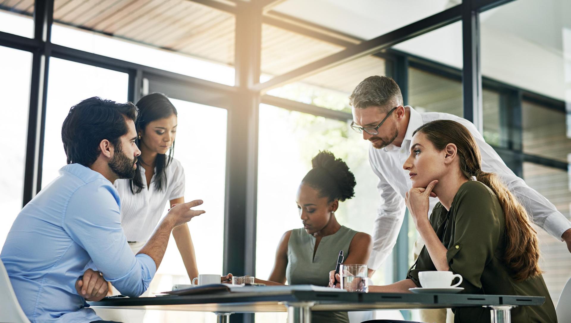 Group of diverse individuals having a meeting