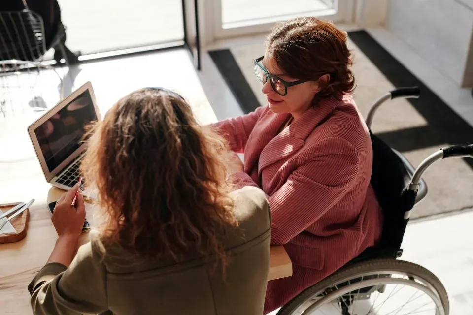 two colleagues at a meeting