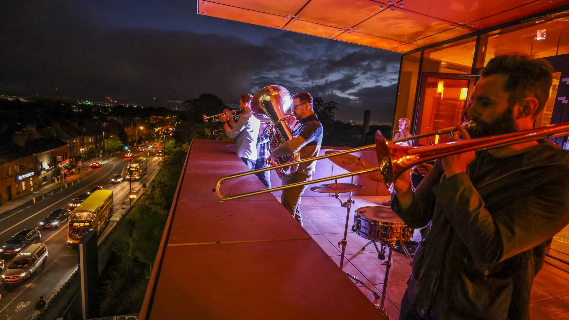 Stomptown Brass playing on the balcony of Cregan Library for Culture Night 