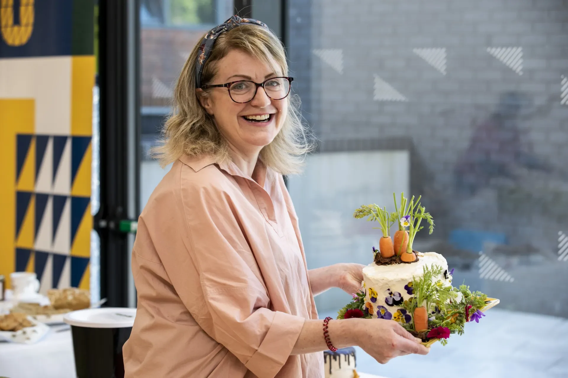 Shows Marcella Bannon with her carrot cake 