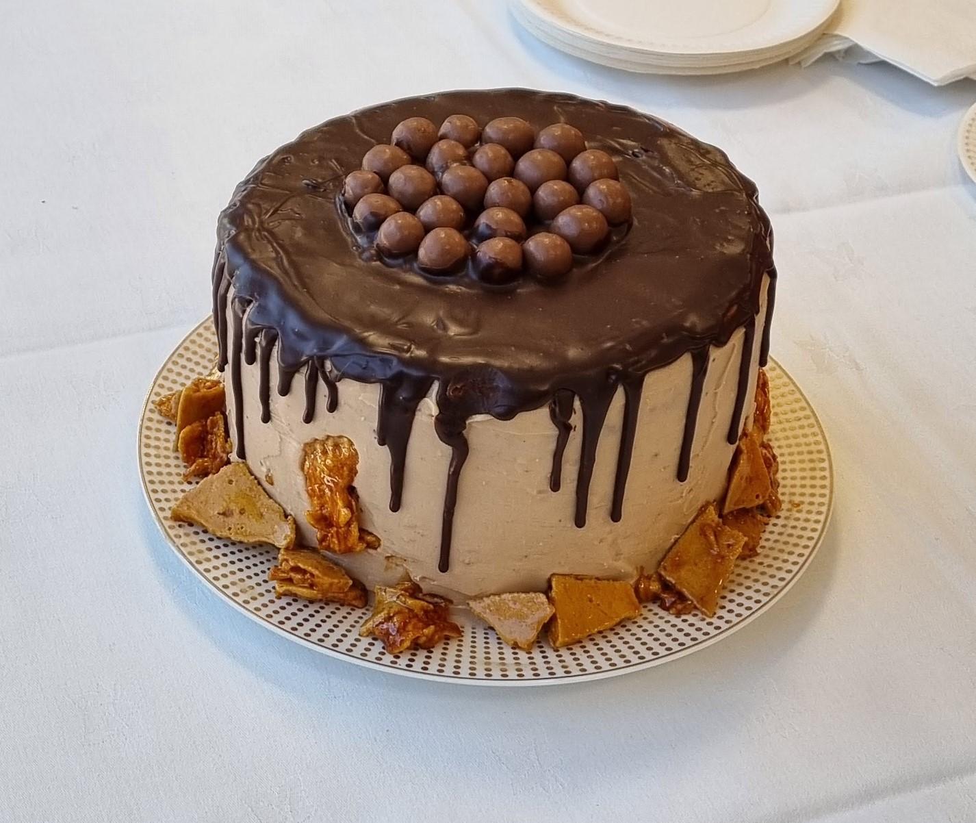 Shows Tom Swift's Chocolate Drip Cake during the DCU Bake Off for Barretstown