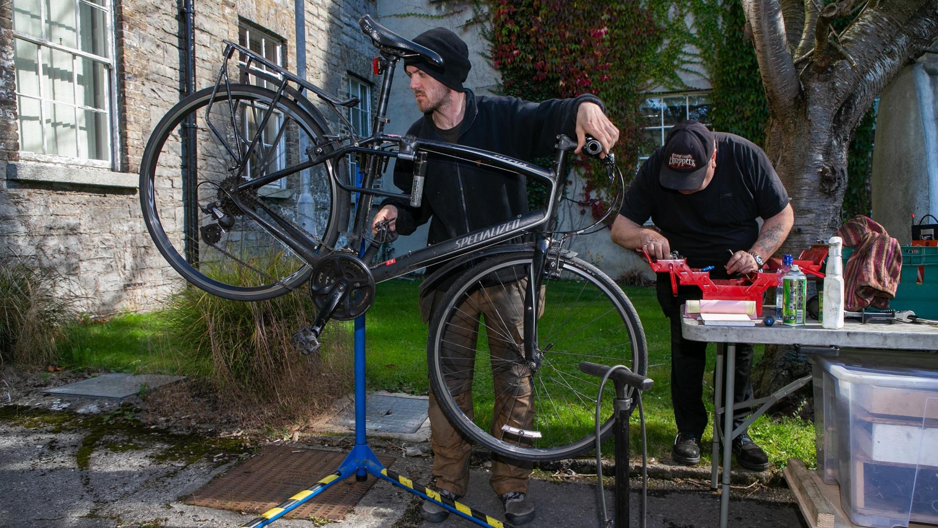Shows the bike servicing clinic on DCU's Glasnevin campus