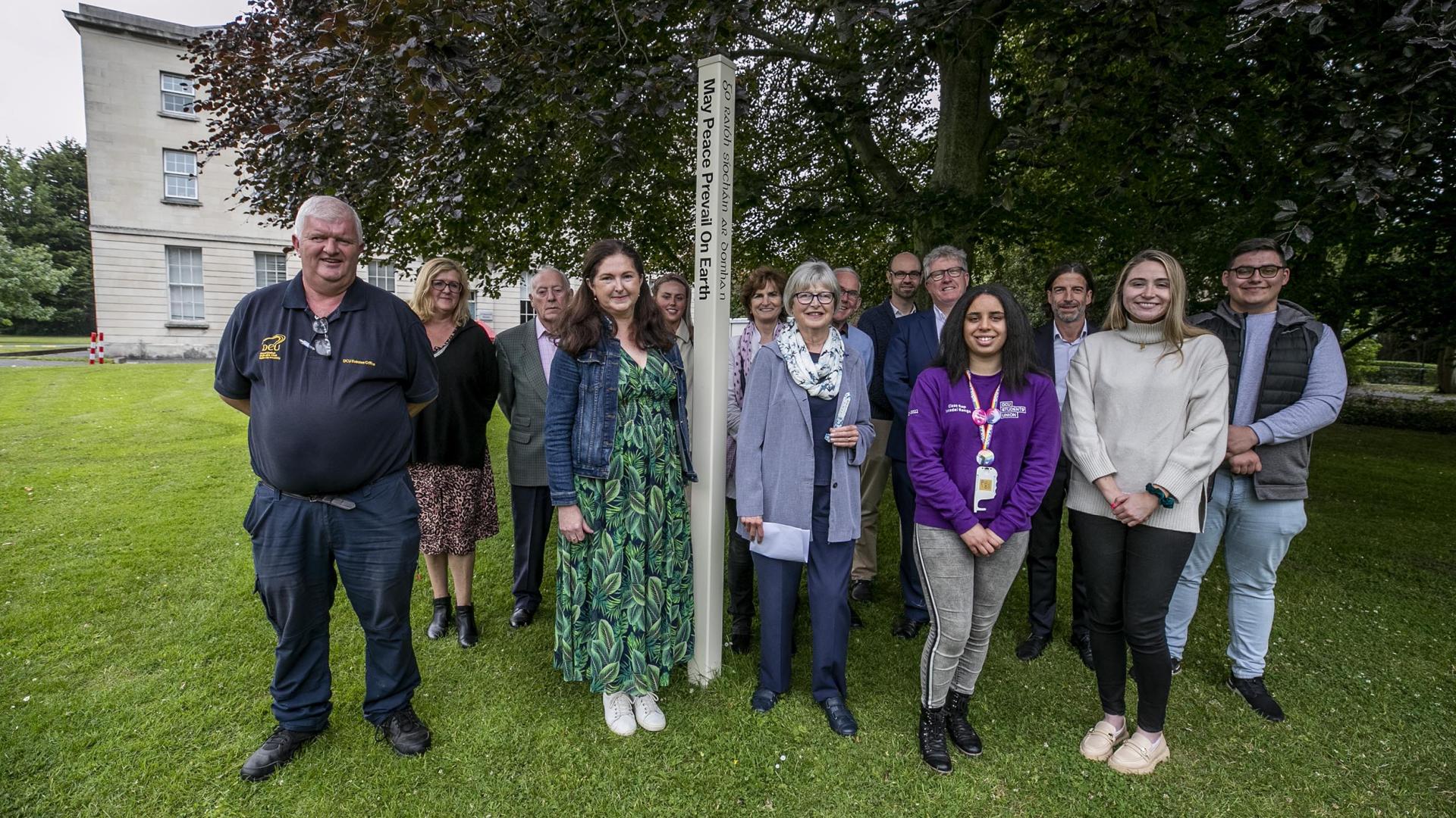 Shows Rotary Peace Pole on DCU's All Hallows Campus