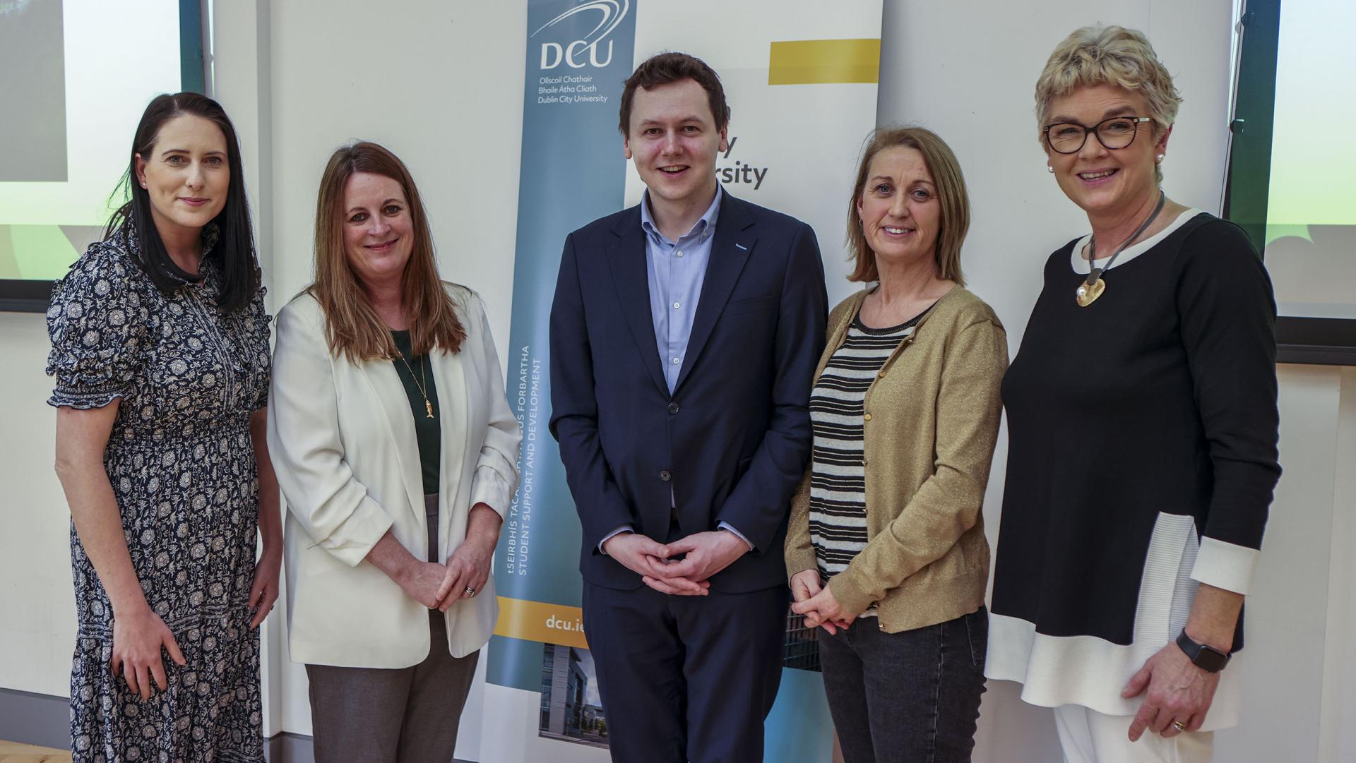 Shows DCU staff with Adam Harris at launch of Phase 2 of DCU Autism Friendly