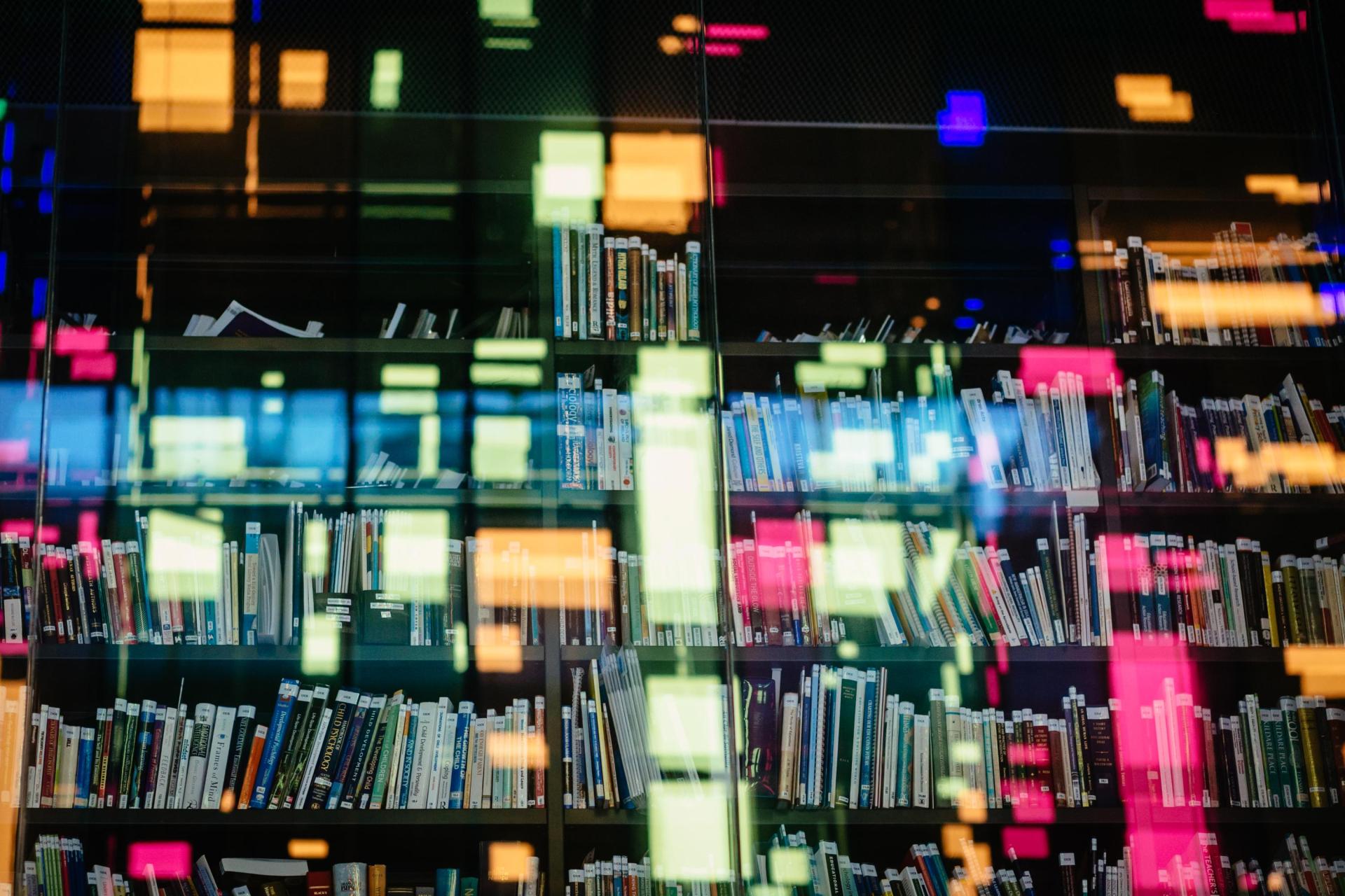 A snapshot of a library taken through a window.