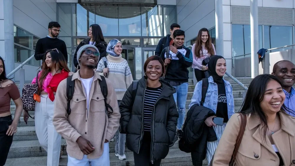 Students walking out of building